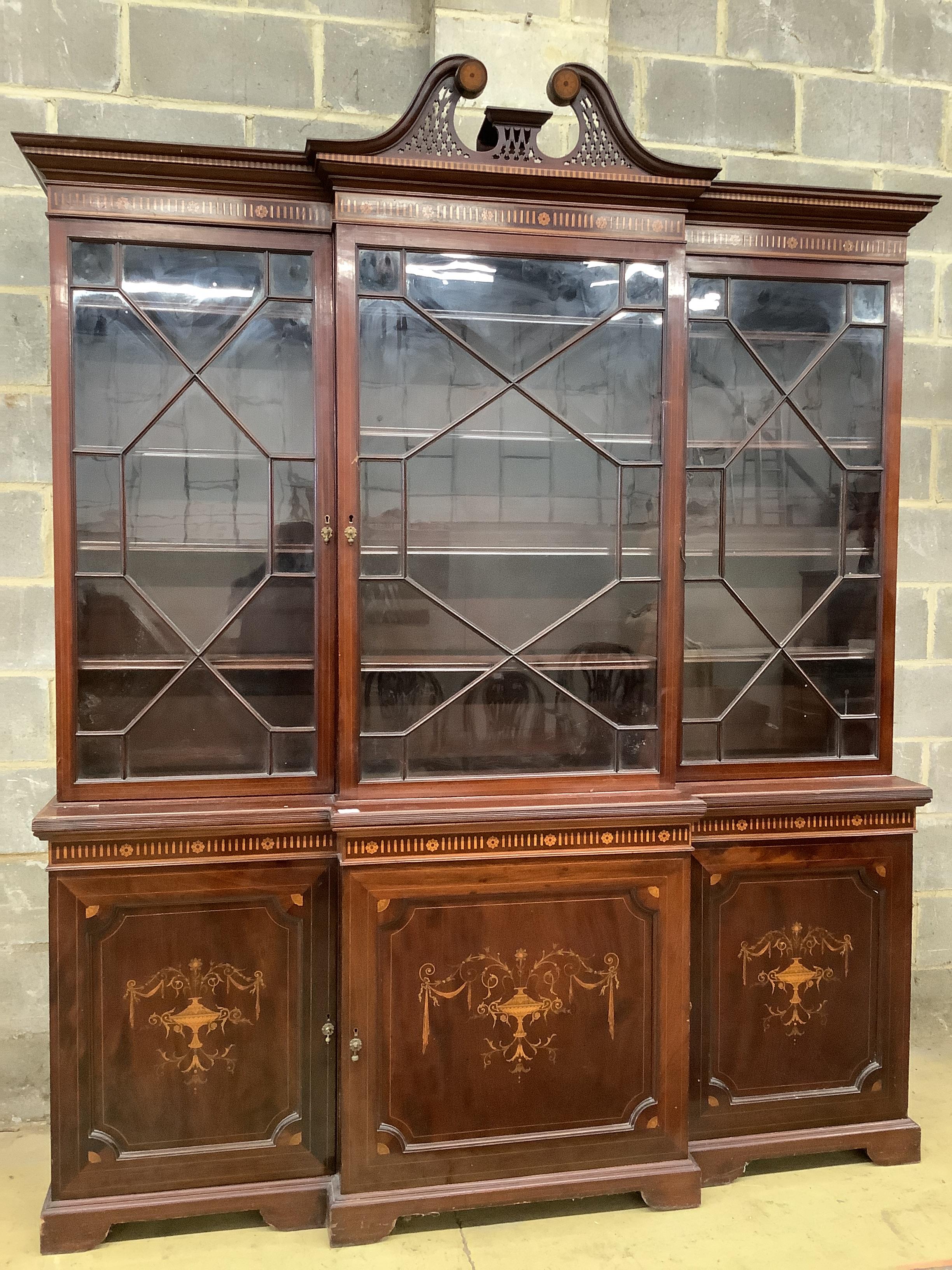 A Sheraton Revival mahogany and marquetry inlaid breakfront library bookcase, width 205cm, depth 52cm, height 245cm